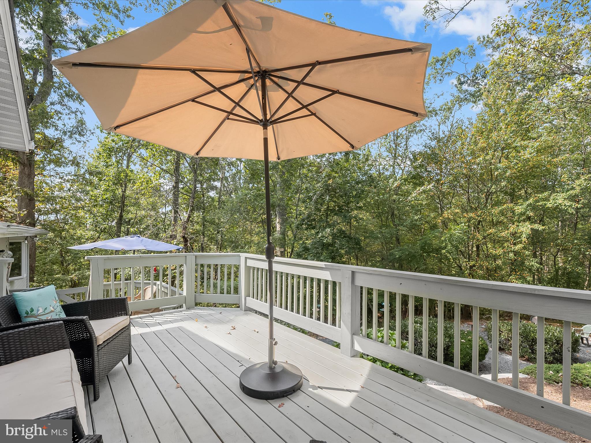 4950 Fleming Road Mount Airy, MD 21771 - Photo 43 of 64 a view of balcony with furniture and umbrella