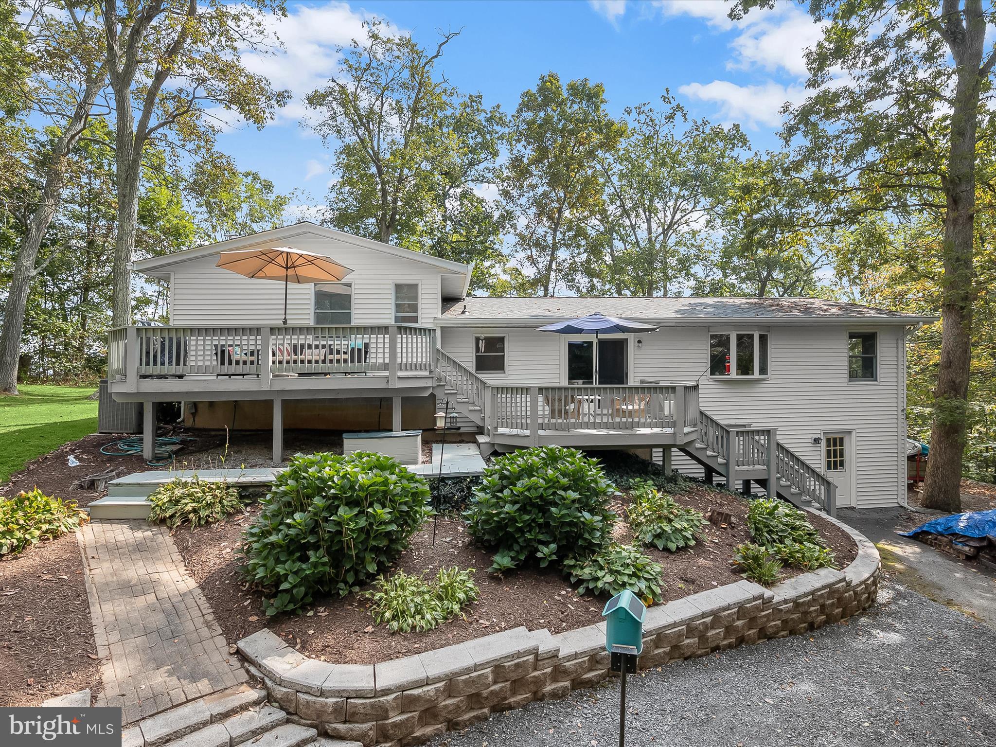 4950 Fleming Road Mount Airy, MD 21771 - Photo 47 of 64 a front view of a house with a yard