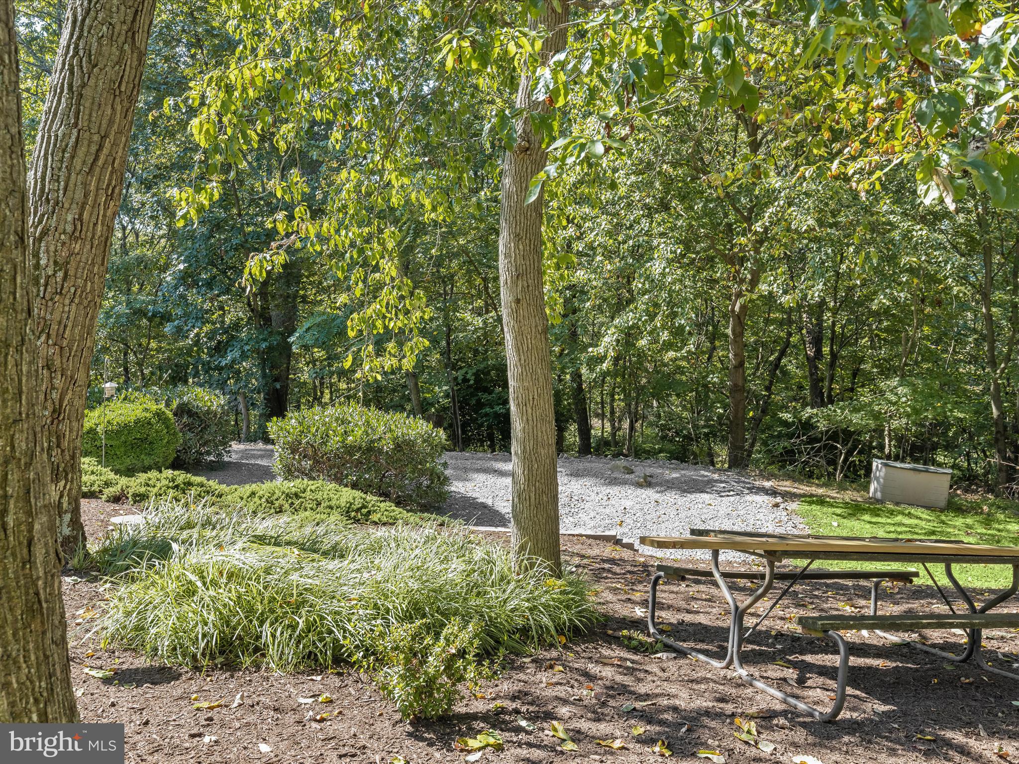 4950 Fleming Road Mount Airy, MD 21771 - Photo 48 of 64 a view of a bench in a garden
