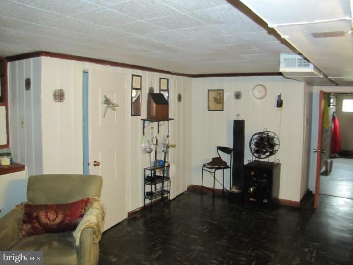 8503 Lynnewood Road Philadelphia, PA 19150 - Photo 13 of 20 a living room with furniture and wooden floor