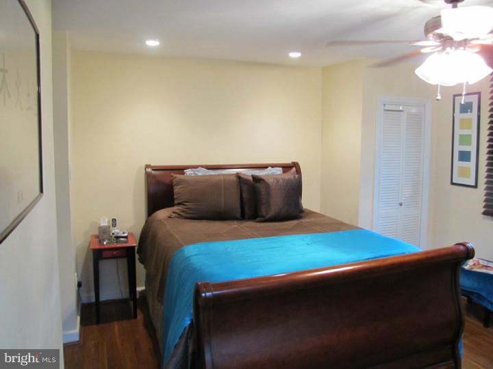 8503 Lynnewood Road Philadelphia, PA 19150 - Photo 14 of 20 a bed sitting in a bedroom next to a window