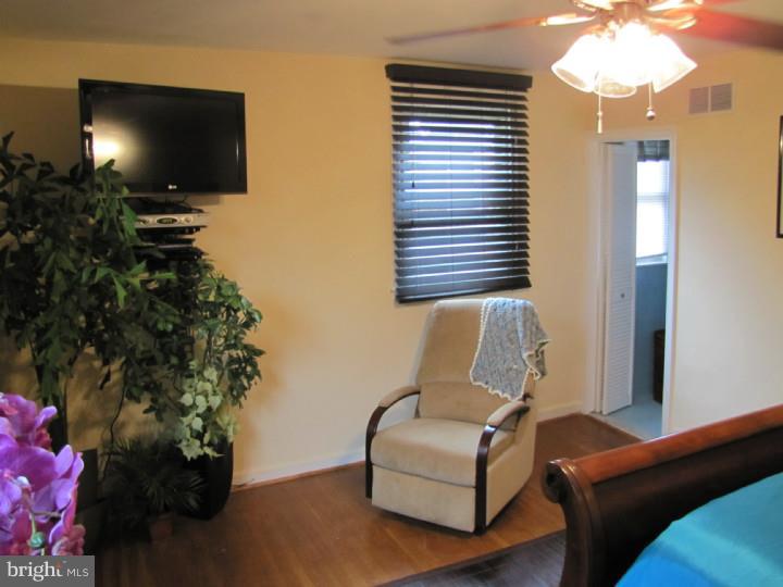 8503 Lynnewood Road Philadelphia, PA 19150 - Photo 16 of 20 a living room with furniture and a flat screen tv