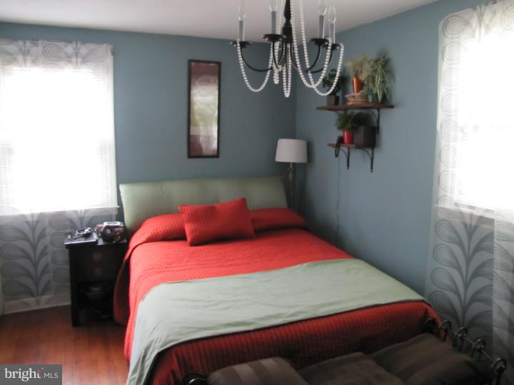 8503 Lynnewood Road Philadelphia, PA 19150 - Photo 17 of 20 a bedroom with a bed and window