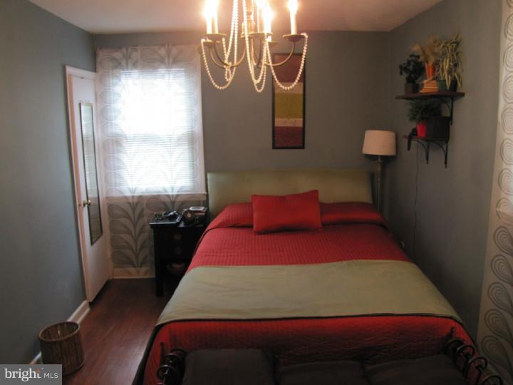 8503 Lynnewood Road Philadelphia, PA 19150 - Photo 18 of 20 a bedroom with a bed and a window
