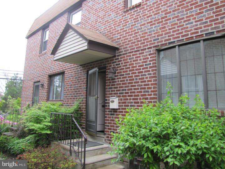 8503 Lynnewood Road Philadelphia, PA 19150 - Photo 3 of 20 a front view of a house with plants