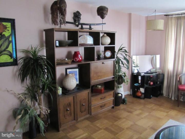 8503 Lynnewood Road Philadelphia, PA 19150 - Photo 6 of 20 a living room with furniture and a potted plant