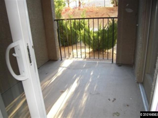 9050 Double R, Unit 1312 Reno, NV 89521 - Photo 8 of 9 a view of a porch