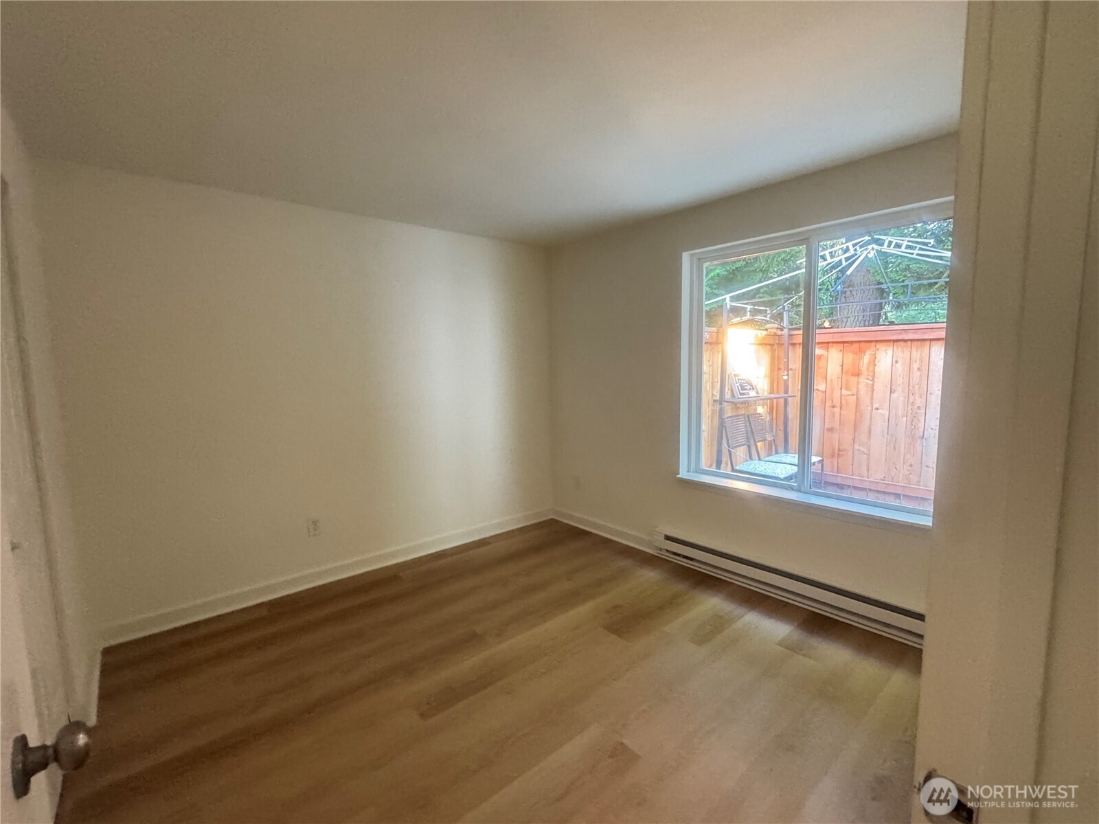 14600 Southeast 176th Street, Unit W11 Renton, WA 98058 - Photo 6 of 8 an empty room with a window