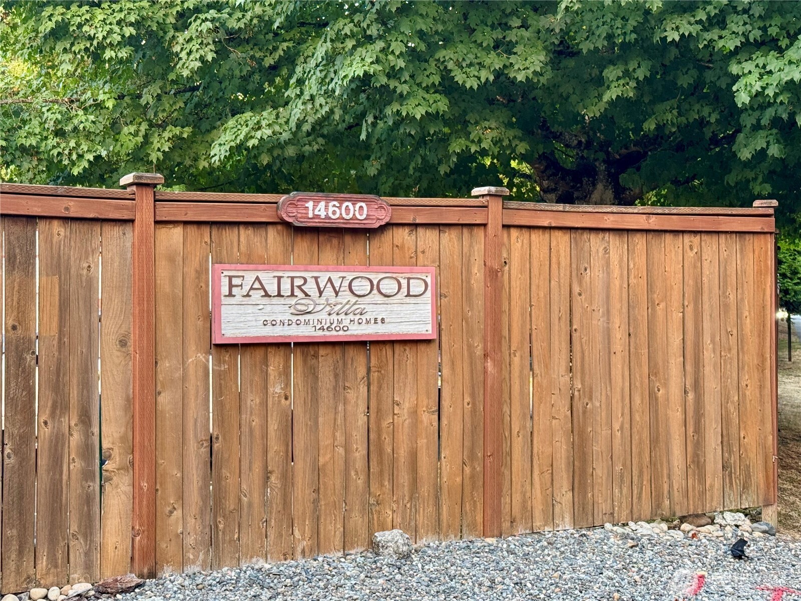 14600 Southeast 176th Street, Unit W11 Renton, WA 98058 - Photo 8 of 8 a view of a sign gate