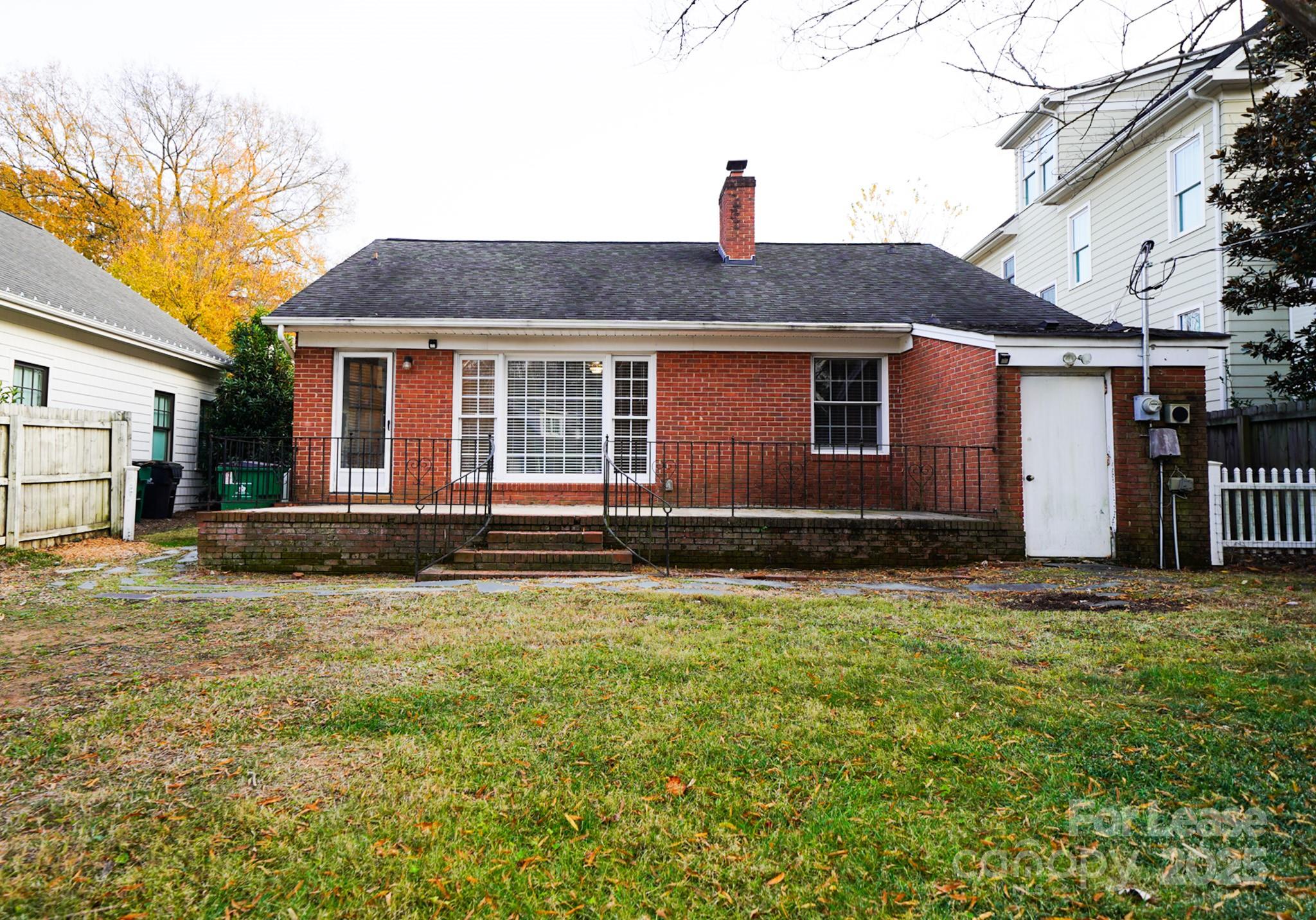 179 North Canterbury Road Charlotte, NC 28211 - Photo 2 of 15 a house that has a big yard in front of it