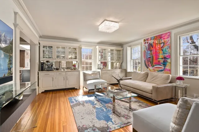a view of a living room and entry way
