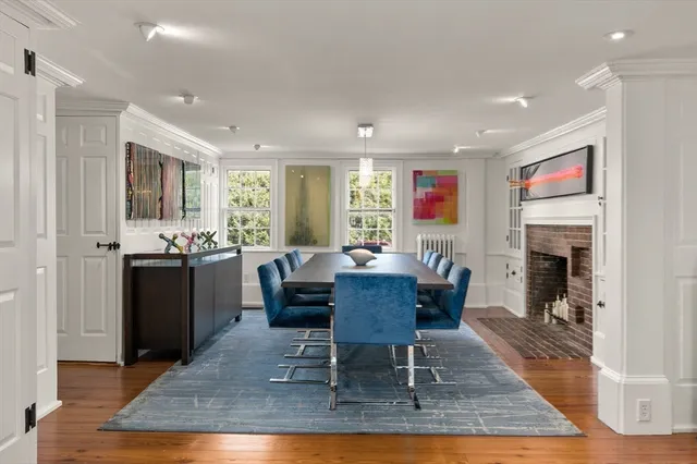 an aerial view of a house with garden space and street view
