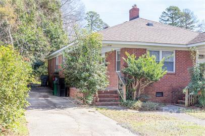 1714 Club Road, Unit 6 Charlotte, NC 28205 - Photo 13 of 14 a front view of a house with garden