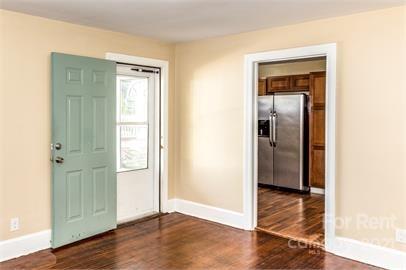 1714 Club Road, Unit 6 Charlotte, NC 28205 - Photo 6 of 14 a view of a hallway with wooden floor