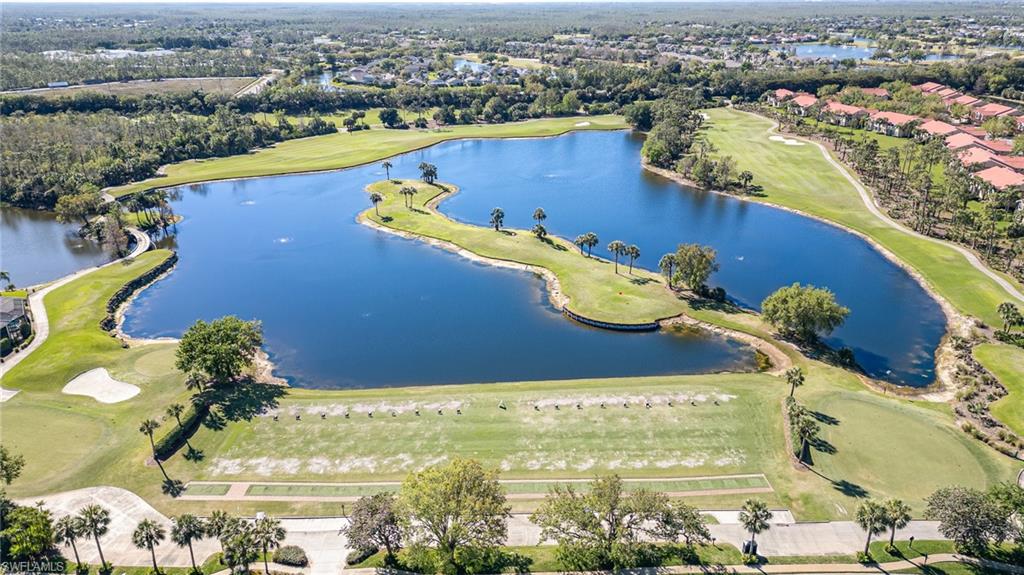 20151 Seagrove Street, Unit 207 Estero, FL 33928 - Photo 22 of 22 an aerial view of a residential houses with outdoor space