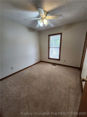 a bathroom with a double vanity sink toilet mirror and bathtub