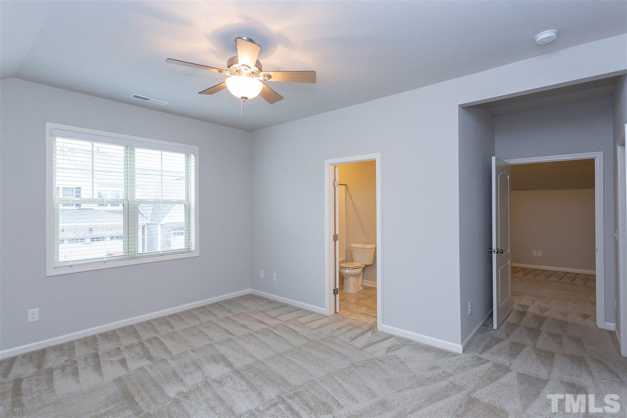 400 Piazza Way Wake Forest, NC 27587 - Photo 18 of 25 an empty room with fan and windows