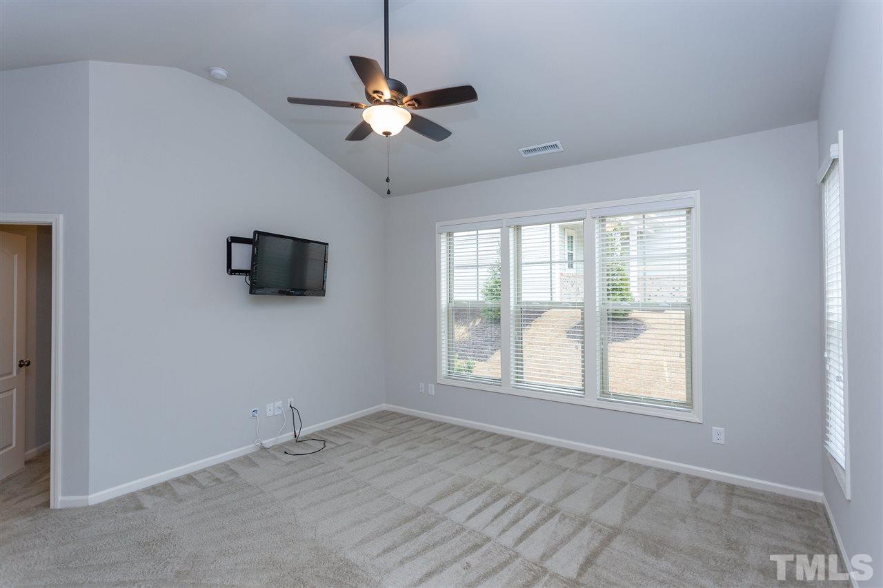 400 Piazza Way Wake Forest, NC 27587 - Photo 9 of 25 a view of an empty room with a window