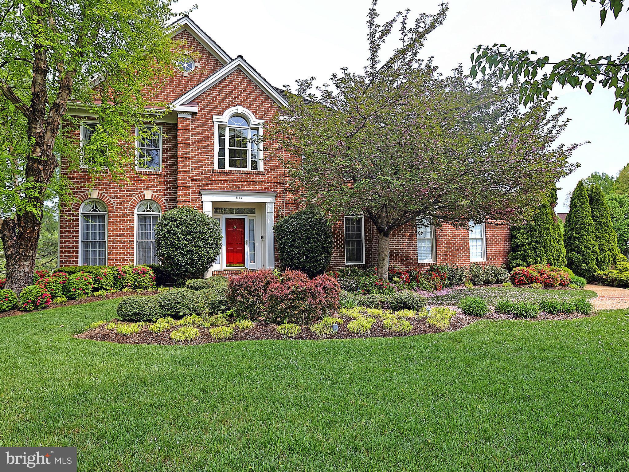 Former model with premium landscaping
