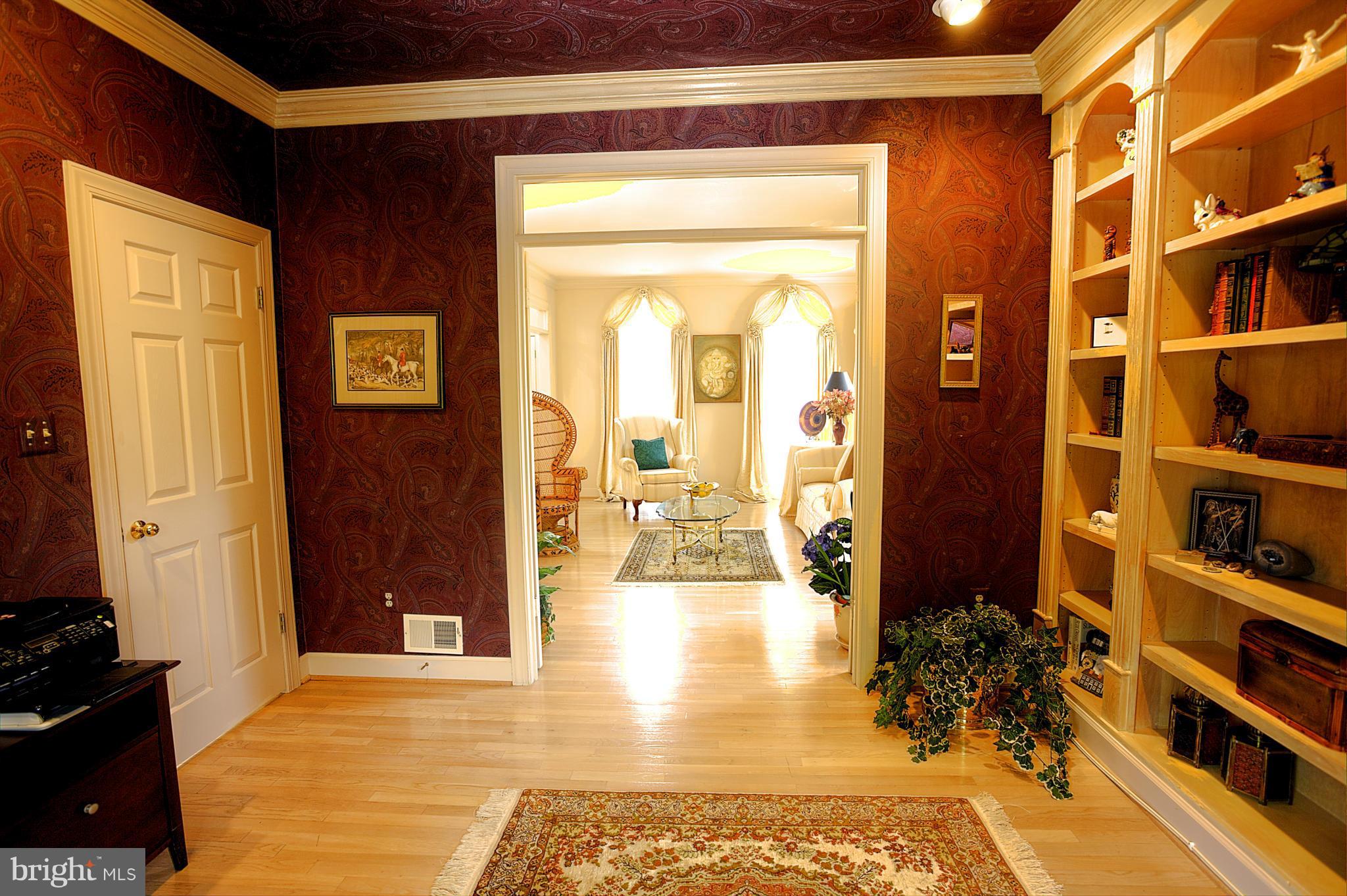 8154 Ridge Creek Way Springfield, VA 22153 - Photo 15 of 30 Library with built-ins & view to living room
