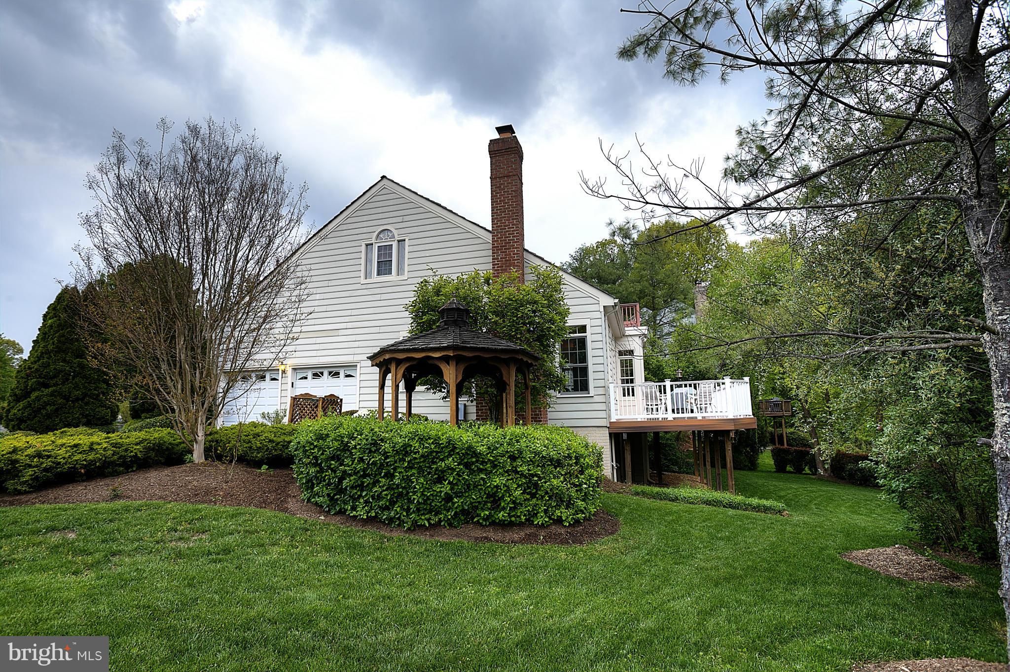 8154 Ridge Creek Way Springfield, VA 22153 - Photo 28 of 30 2 car side load garage plus gazebo