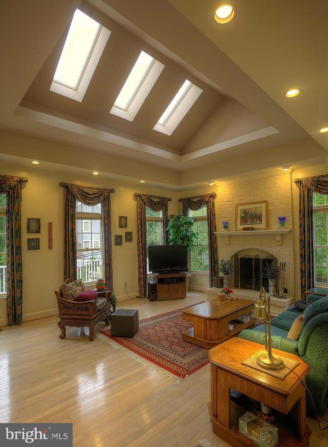 8154 Ridge Creek Way Springfield, VA 22153 - Photo 8 of 30 Family Room with gas fireplace & skylights