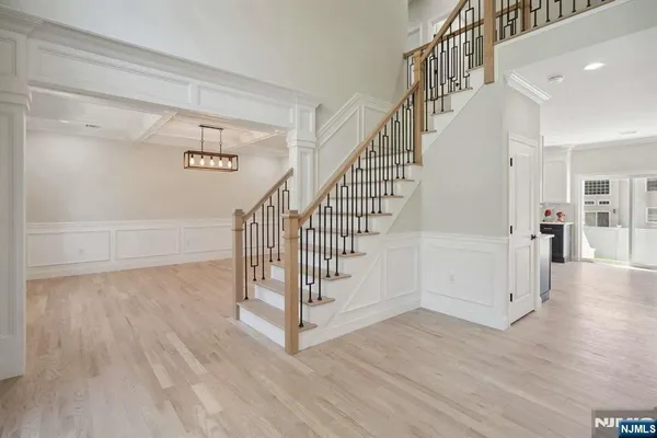 a view of entryway with wooden floor