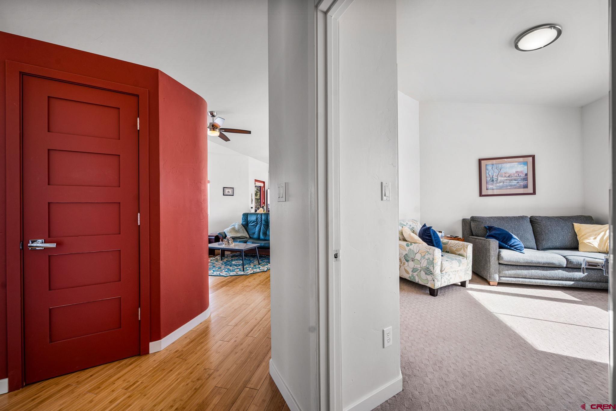 59 Chesterfield Place Ignacio, CO 81137 - Photo 17 of 35 a bedroom with furniture and a chandelier