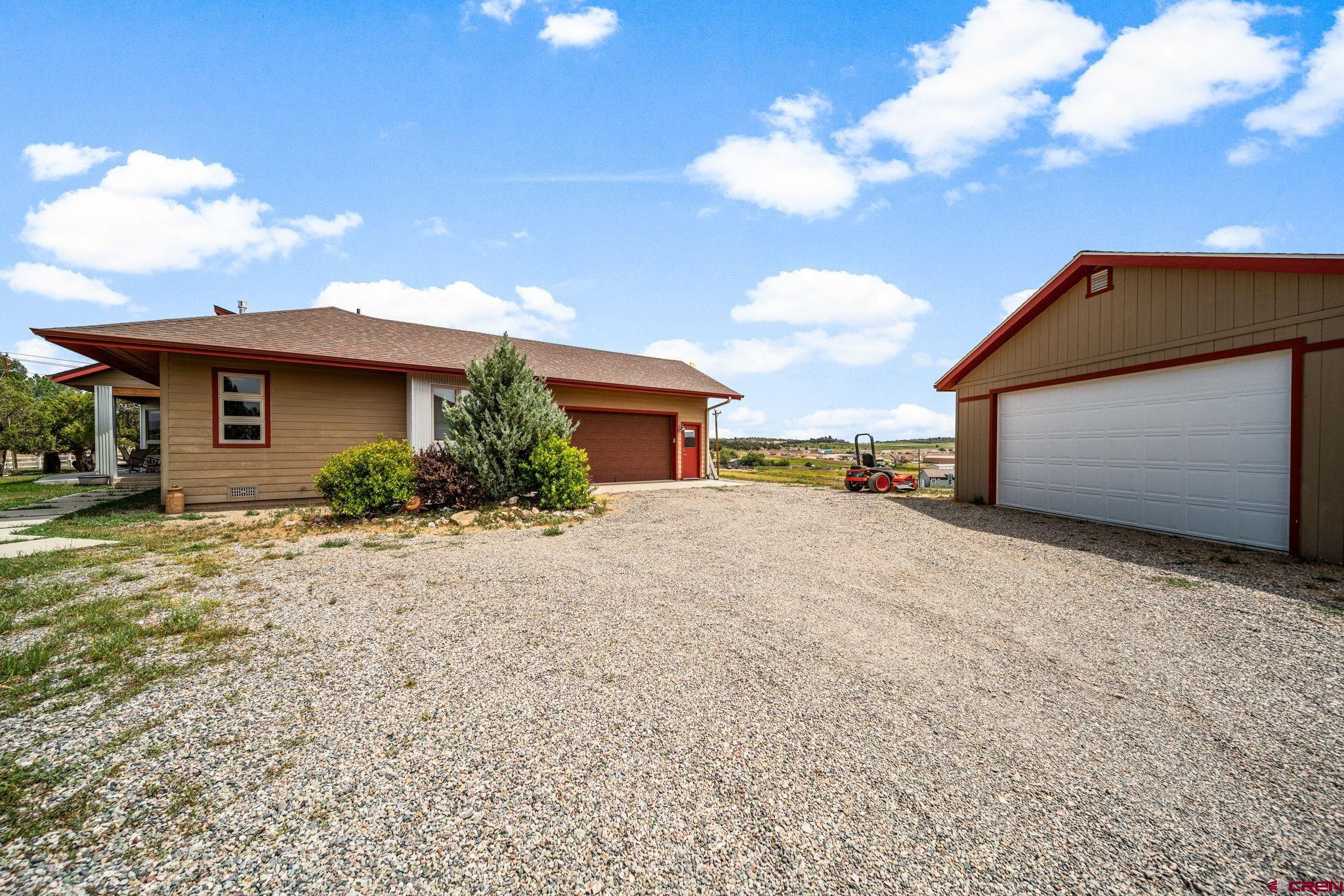 59 Chesterfield Place Ignacio, CO 81137 - Photo 32 of 35 a view of a house with backyard and a garden