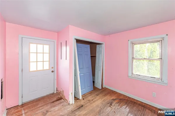 an empty room with windows
