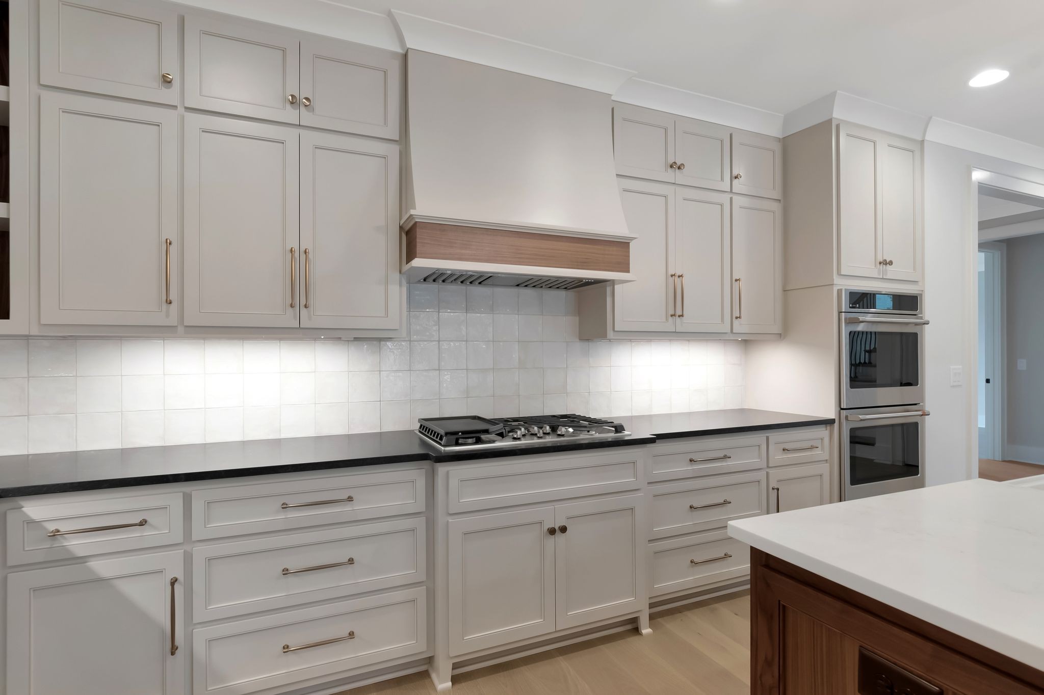 1072 Poplar Hill Road Lebanon, TN 37090 - Photo 12 of 49 a kitchen with white cabinets and white appliances