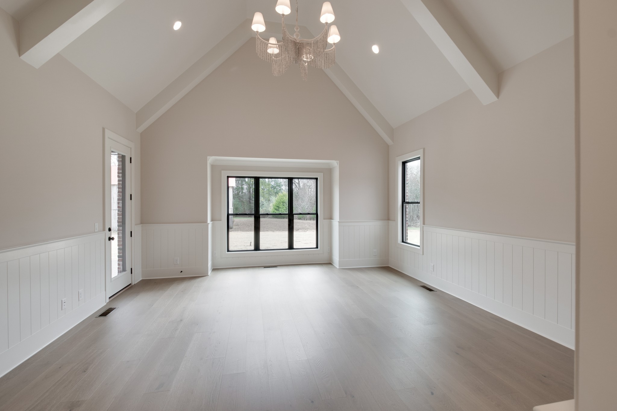 1072 Poplar Hill Road Lebanon, TN 37090 - Photo 23 of 49 an empty room with wooden floor and windows