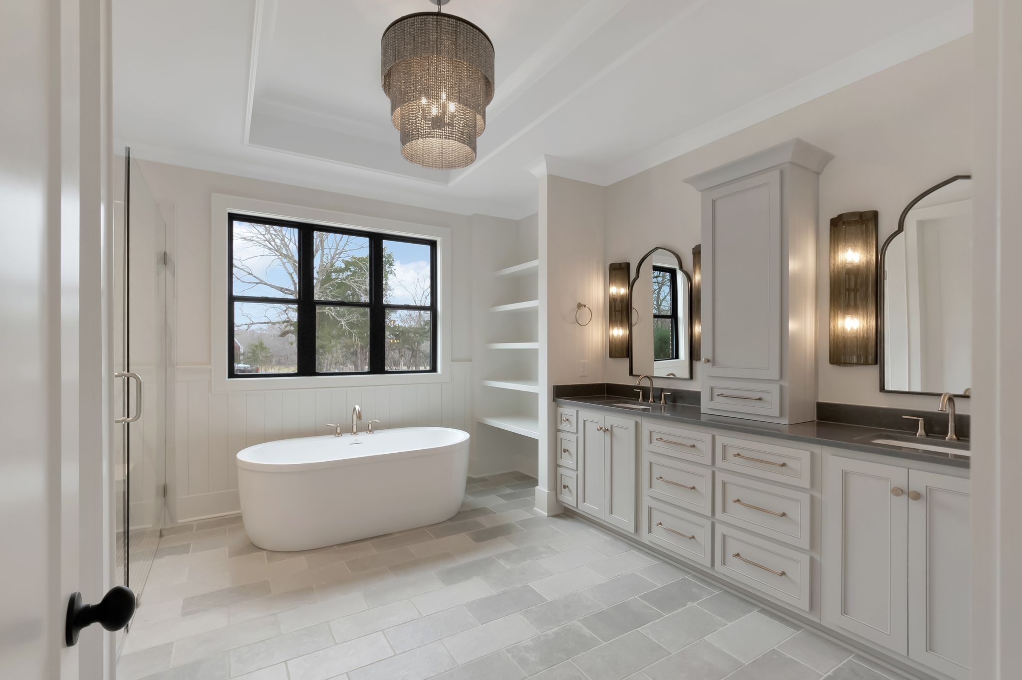 1072 Poplar Hill Road Lebanon, TN 37090 - Photo 24 of 49 a spacious bathroom with a double vanity sink a mirror and a bathtub