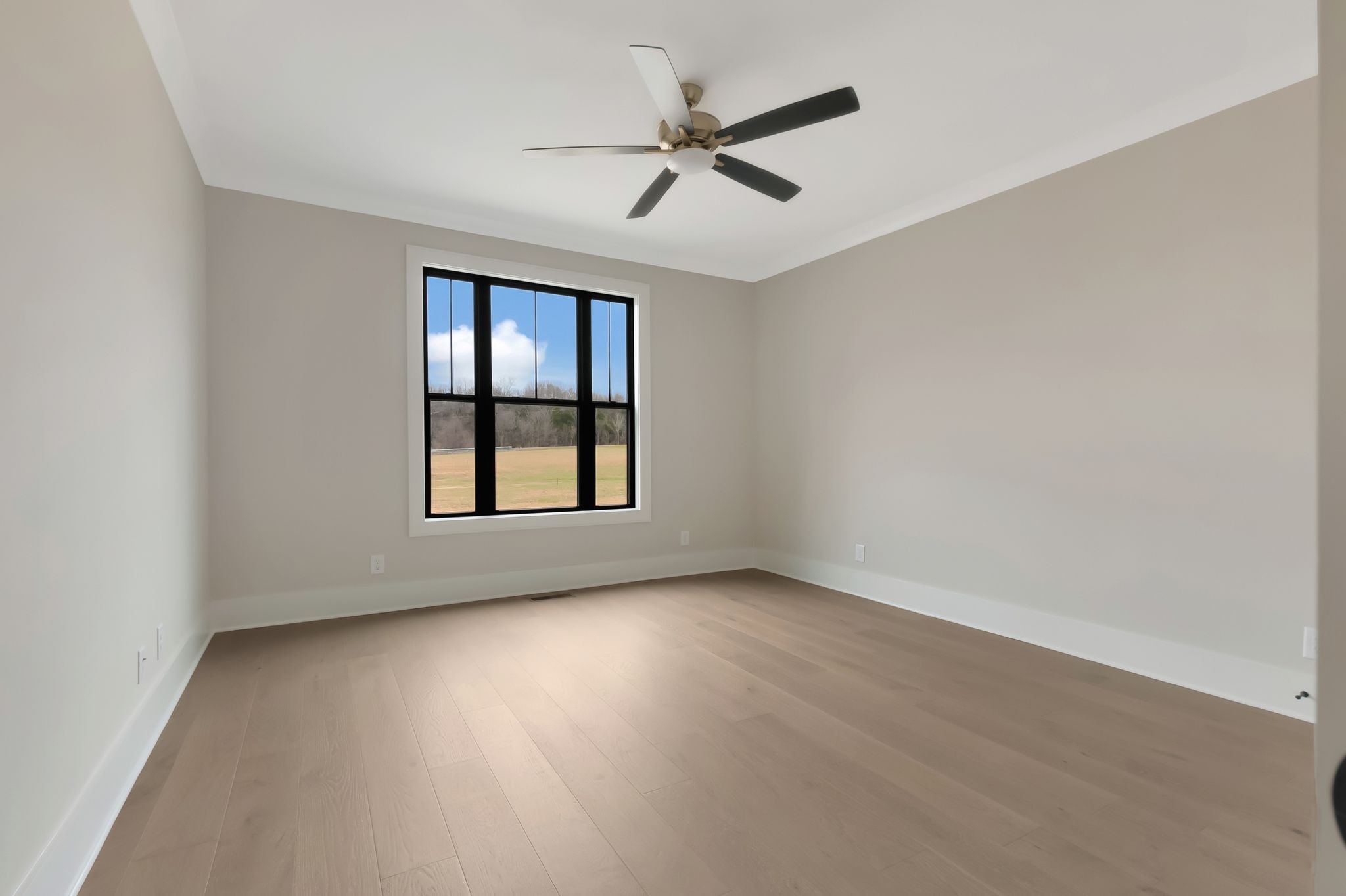 1072 Poplar Hill Road Lebanon, TN 37090 - Photo 28 of 49 wooden floor in an empty room with a window