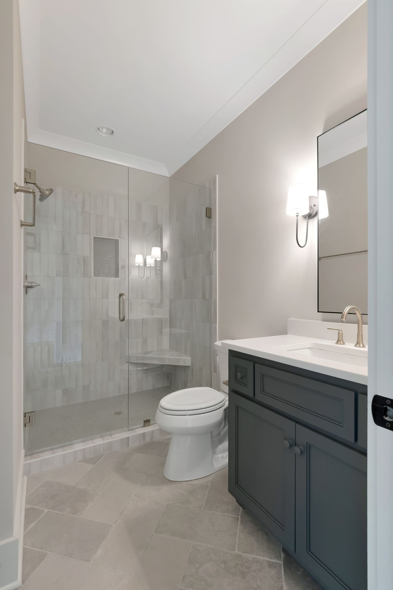 1072 Poplar Hill Road Lebanon, TN 37090 - Photo 29 of 49 a bathroom with a sink toilet a mirror and shower