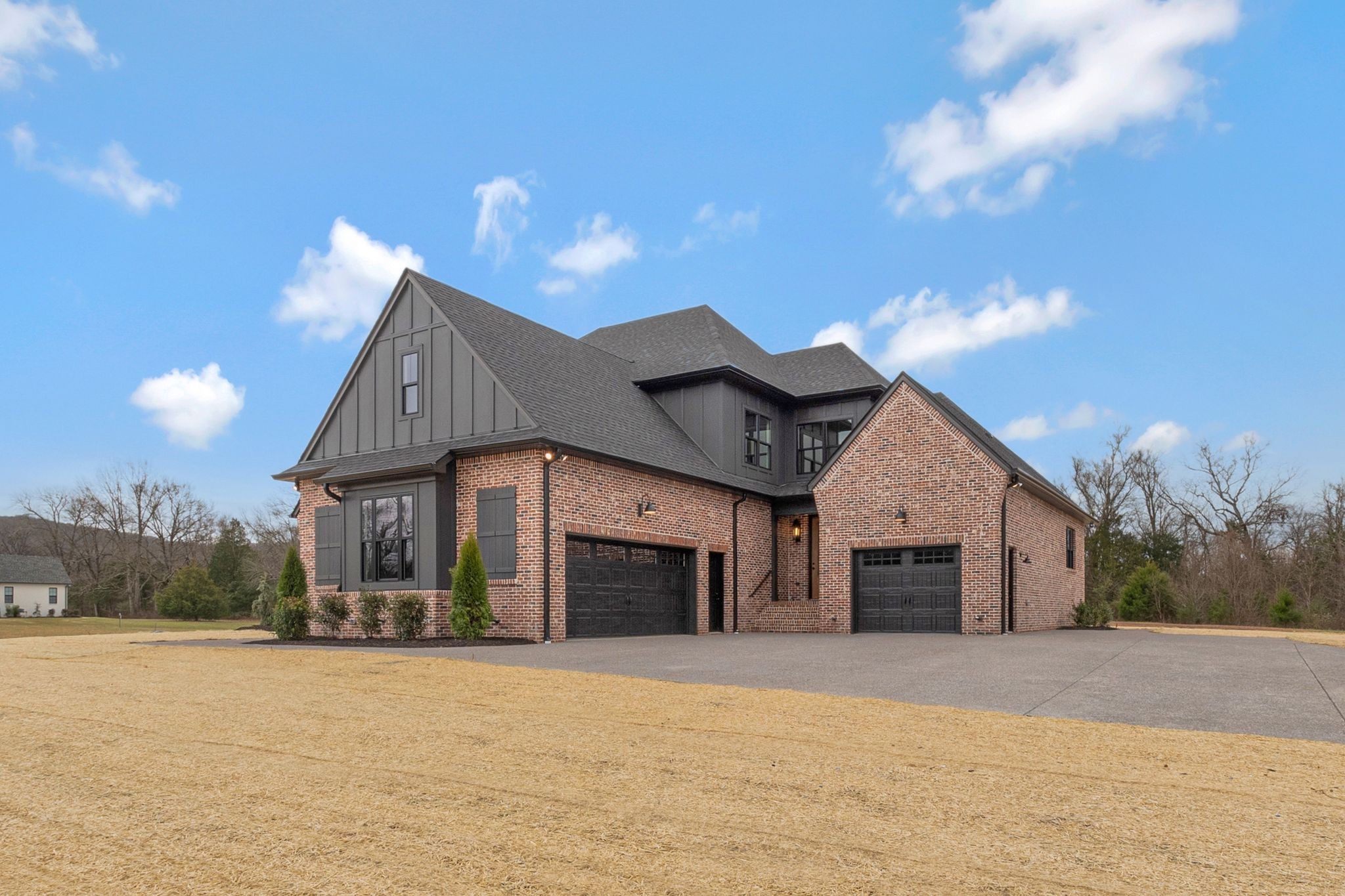 1072 Poplar Hill Road Lebanon, TN 37090 - Photo 3 of 49 a front view of a house with a yard and garage