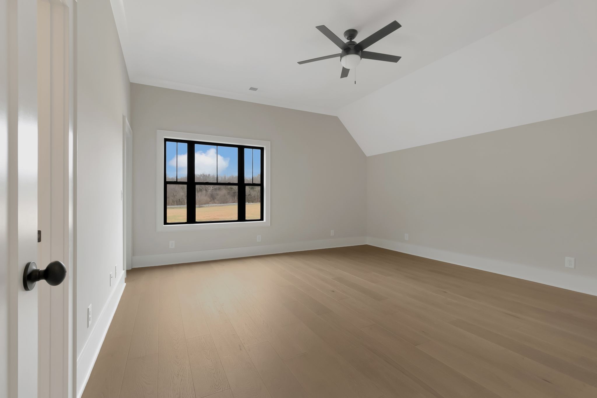 1072 Poplar Hill Road Lebanon, TN 37090 - Photo 34 of 49 wooden floor in an empty room with a window