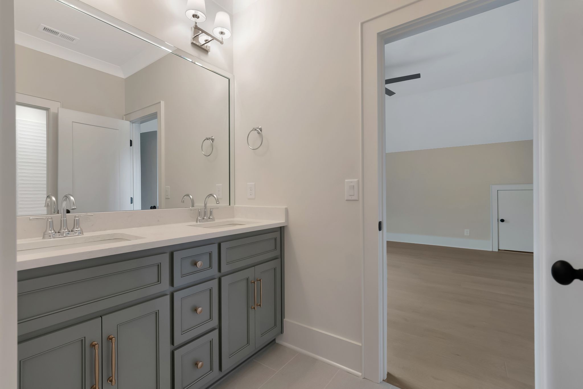 1072 Poplar Hill Road Lebanon, TN 37090 - Photo 36 of 49 a bathroom with a double vanity sink and a mirror