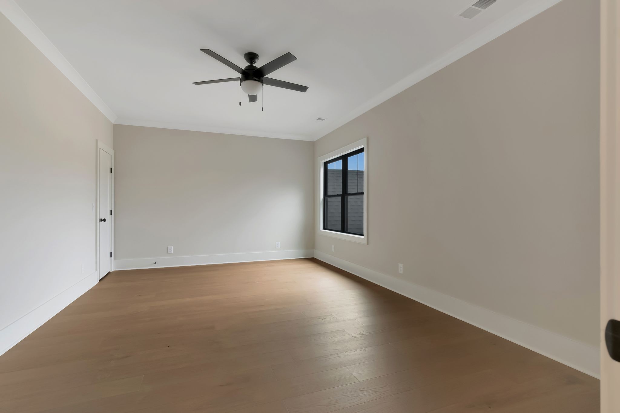 1072 Poplar Hill Road Lebanon, TN 37090 - Photo 42 of 49 wooden floor in an empty room with a window