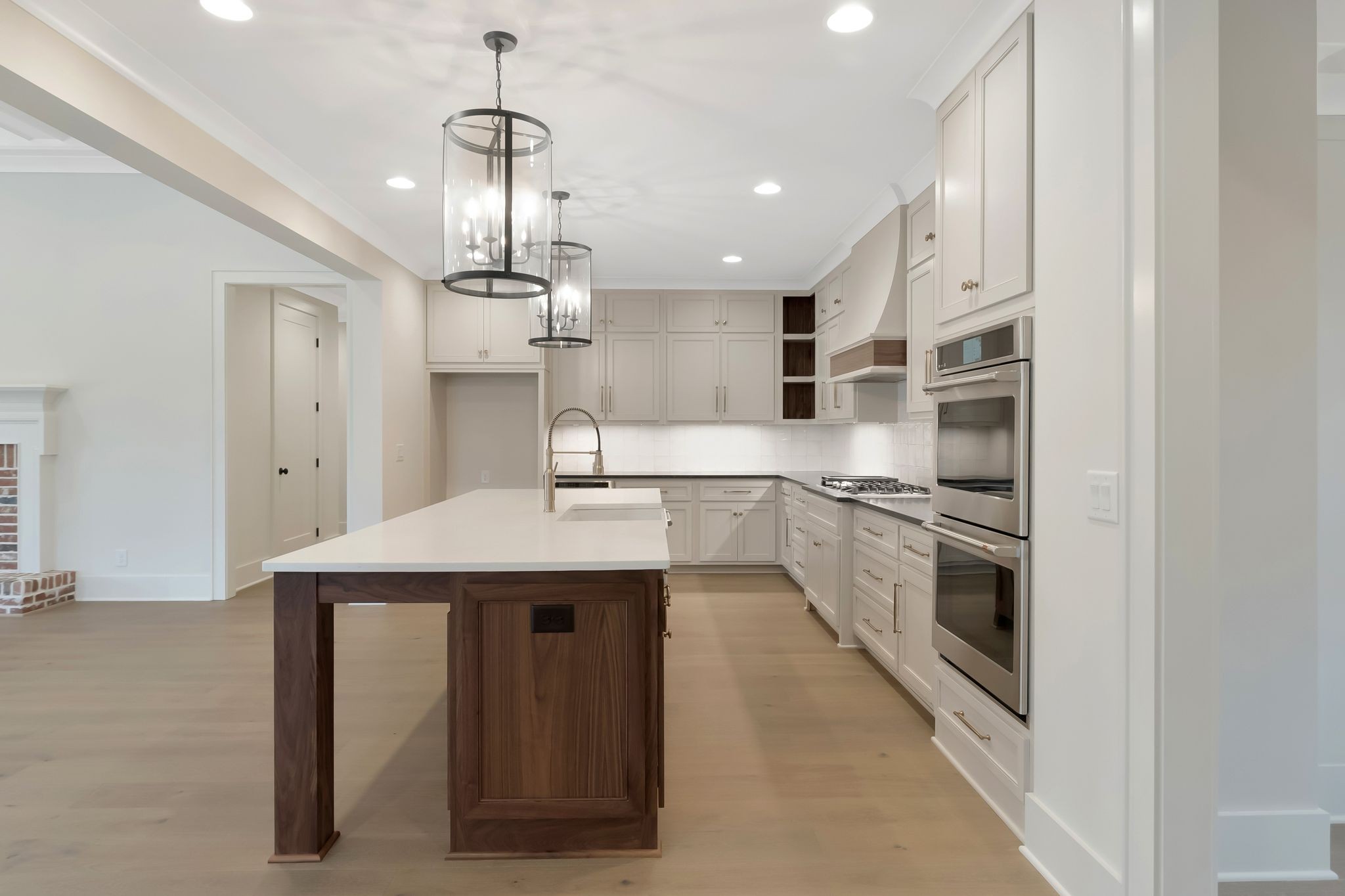 1072 Poplar Hill Road Lebanon, TN 37090 - Photo 8 of 49 a kitchen with stainless steel appliances granite countertop a sink and cabinets
