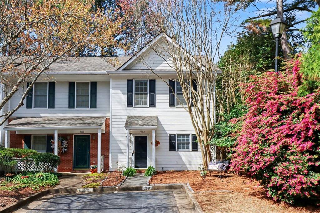 3982 Camden Way Alpharetta, GA 30005 - Photo 1 of 1 a front view of a house with garden