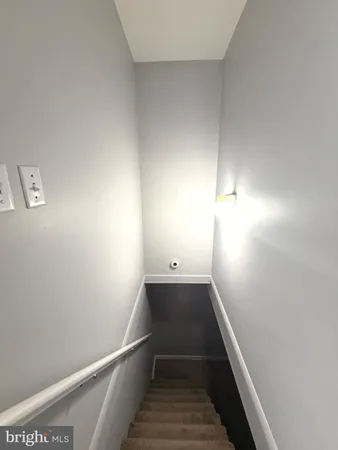 a view of a hallway with an empty space