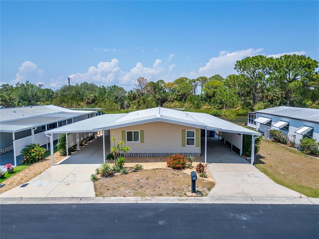 210 North St Thomas Circle Apollo Beach, FL 33572 - Photo 2 of 34 a view of a house with a patio
