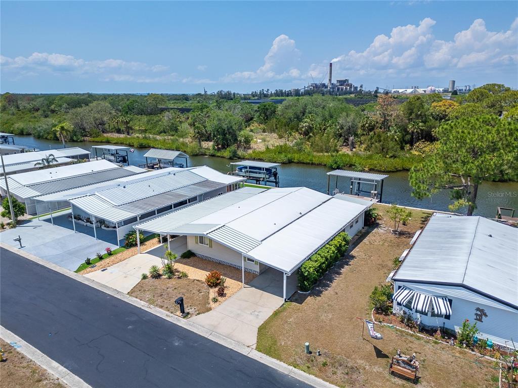 210 North St Thomas Circle Apollo Beach, FL 33572 - Photo 3 of 34 an aerial view of a house with a yard