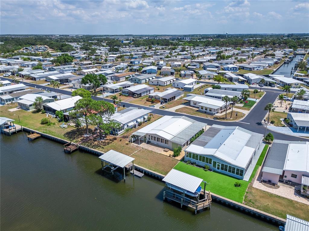 210 North St Thomas Circle Apollo Beach, FL 33572 - Photo 34 of 34 an aerial view of a house with a ocean view