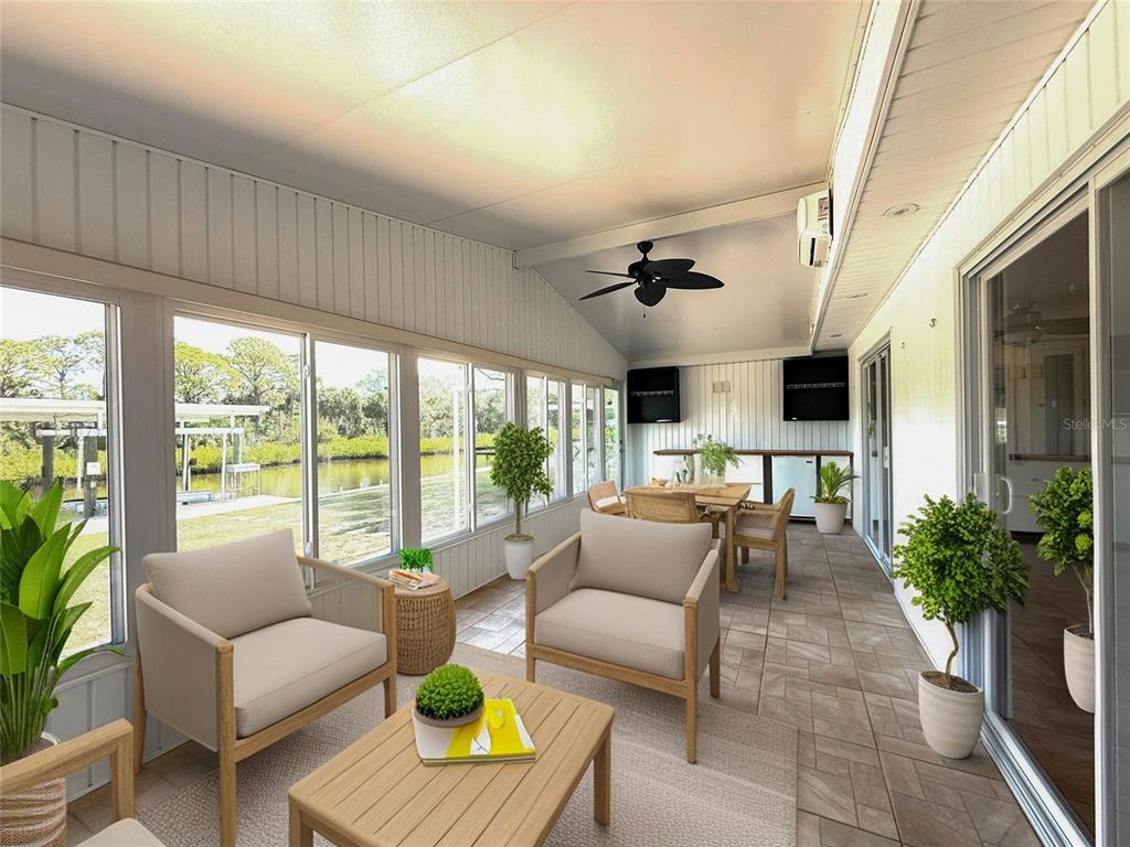 210 North St Thomas Circle Apollo Beach, FL 33572 - Photo 7 of 34 a living room with furniture and a large window