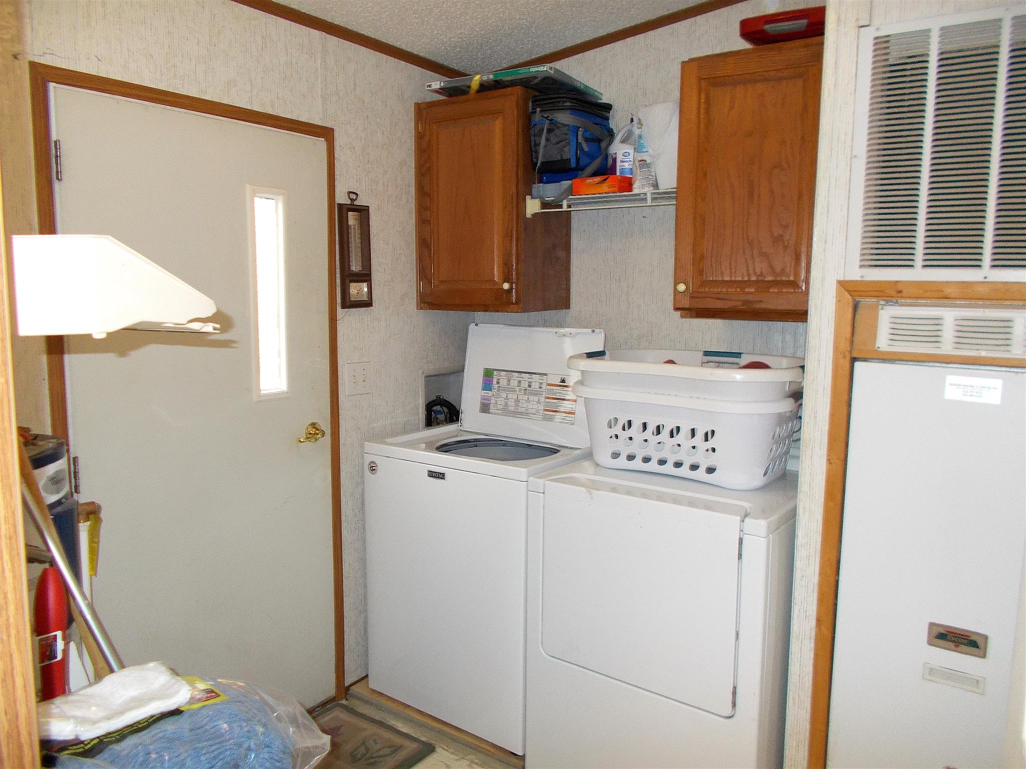 179 Duke Road Dickson, TN 37055 - Photo 22 of 30 a utility room with dryer and washer