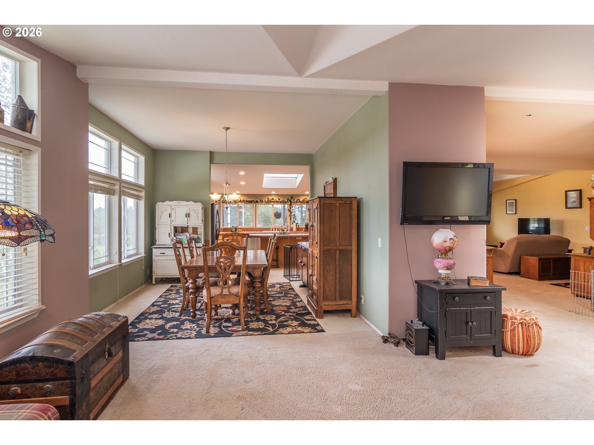 562 Valley Road Roseburg, OR 97471 - Photo 16 of 48 a living room with furniture and a flat screen tv