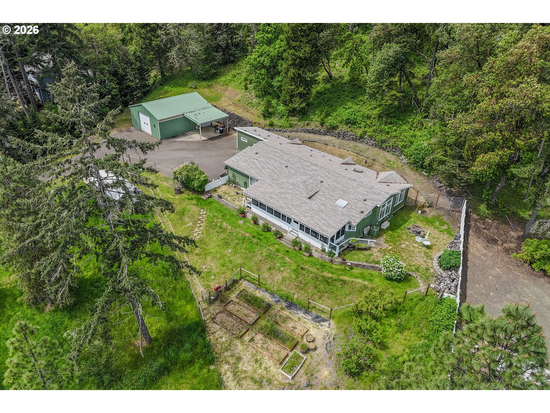 562 Valley Road Roseburg, OR 97471 - Photo 2 of 48 a view of a house with a yard