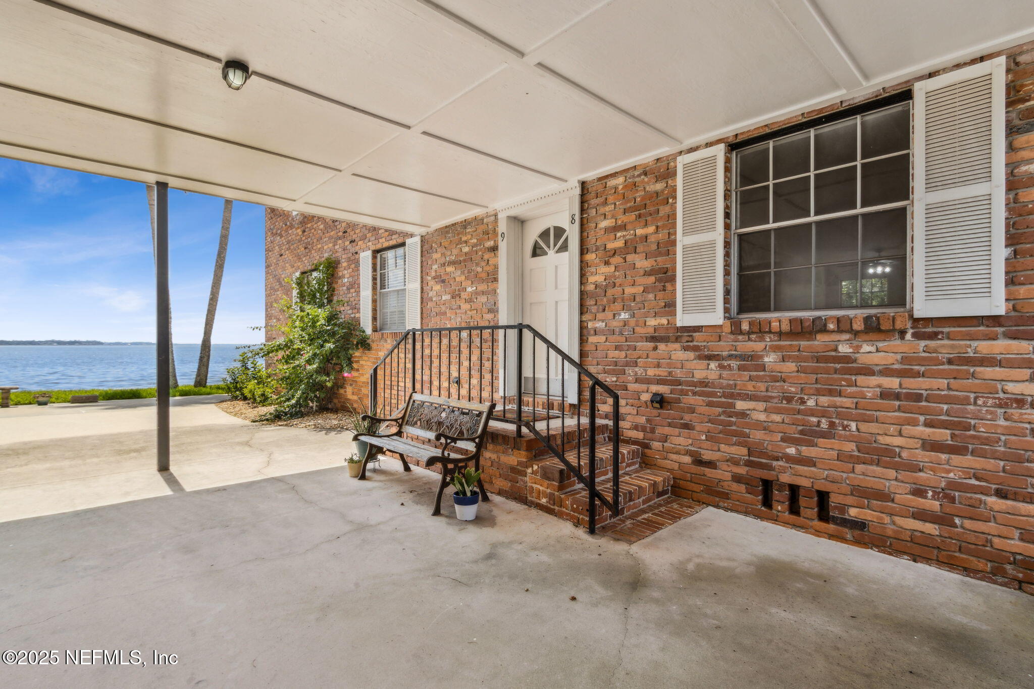 a view of a chair and table in the room